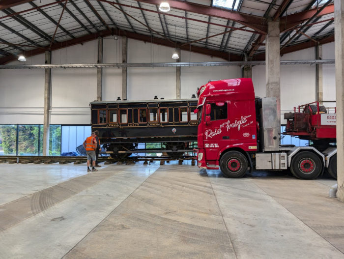 Our restored S&DJR Coach 4 of 1886 moves into its exhibition space at the Hornby museum, Margate.