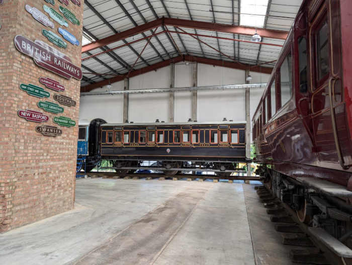 Our restored S&DJR Coach 4 of 1886 moves into its exhibition space at the Hornby museum, Margate.