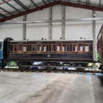 Our restored S&DJR Coach 4 of 1886 moves into its exhibition space at the Hornby museum, Margate.